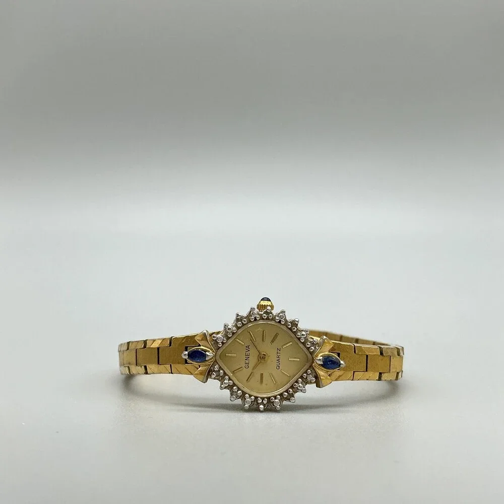 Geneva Womens Watch 16mm Champagne Dial Gold Tone Gemmed Blue Stones FOR PARTS